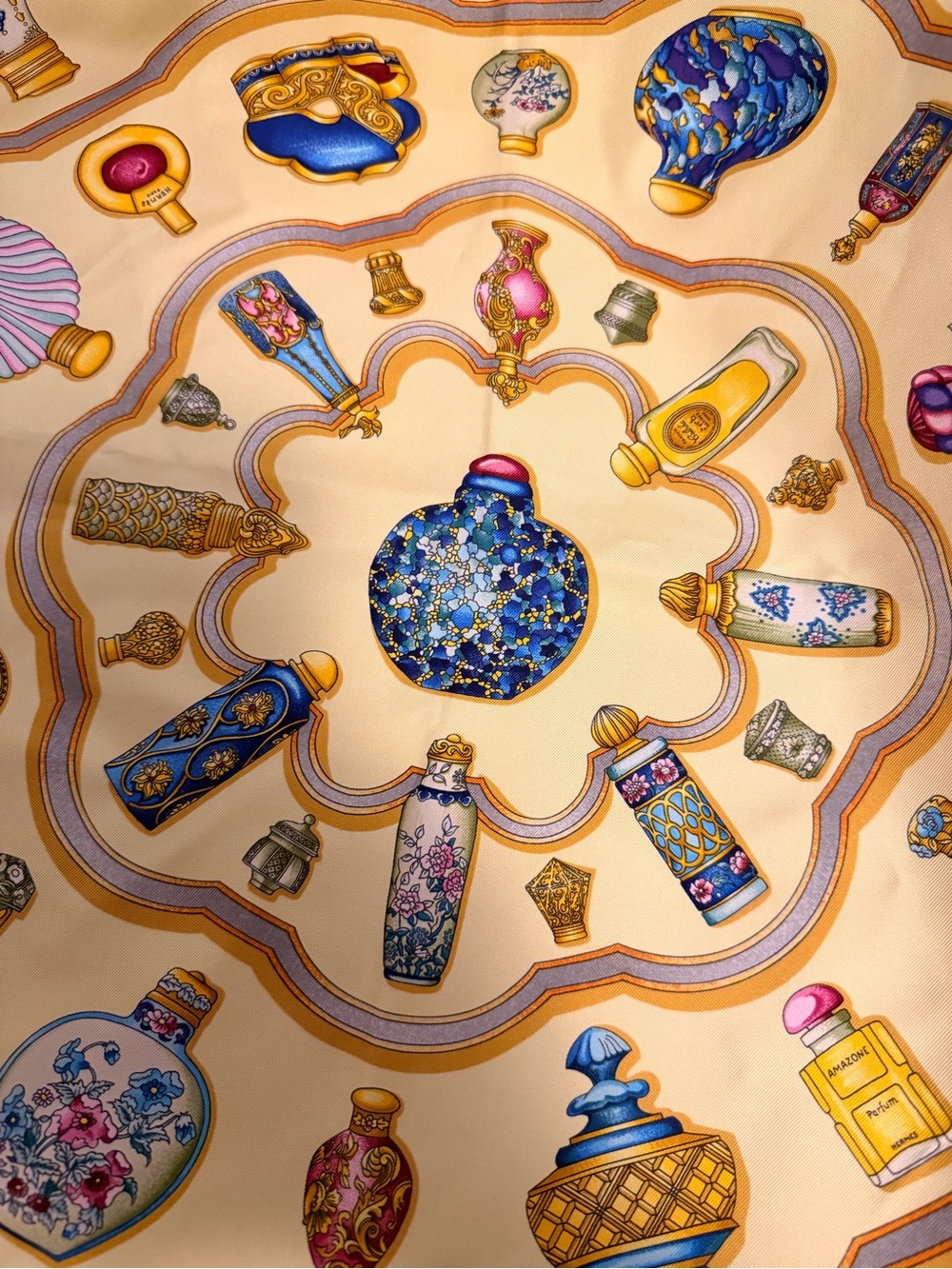 Hermes Cream Silk Scarf with Blue, Gold & Pink Perfume Bottle Motif